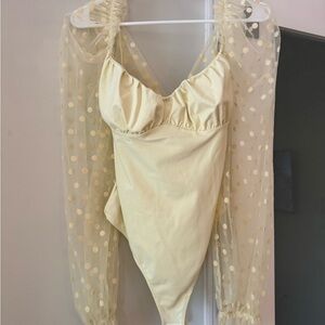 Free People Molly at Midnight Pale Yellow Polka Dot Mesh Sleeve Bodysuit